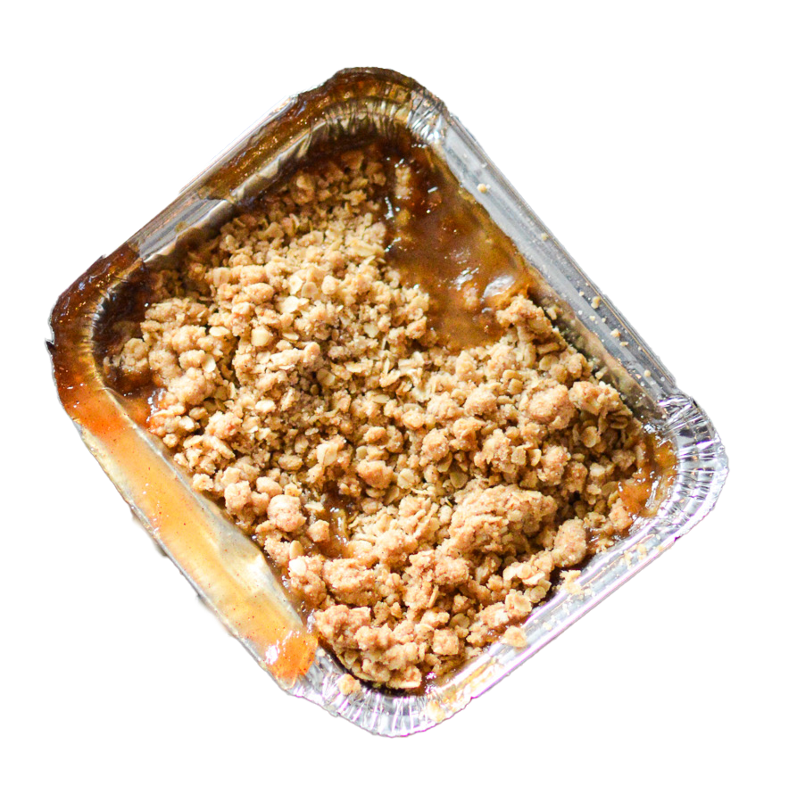 Dessert in a foil container on a white background